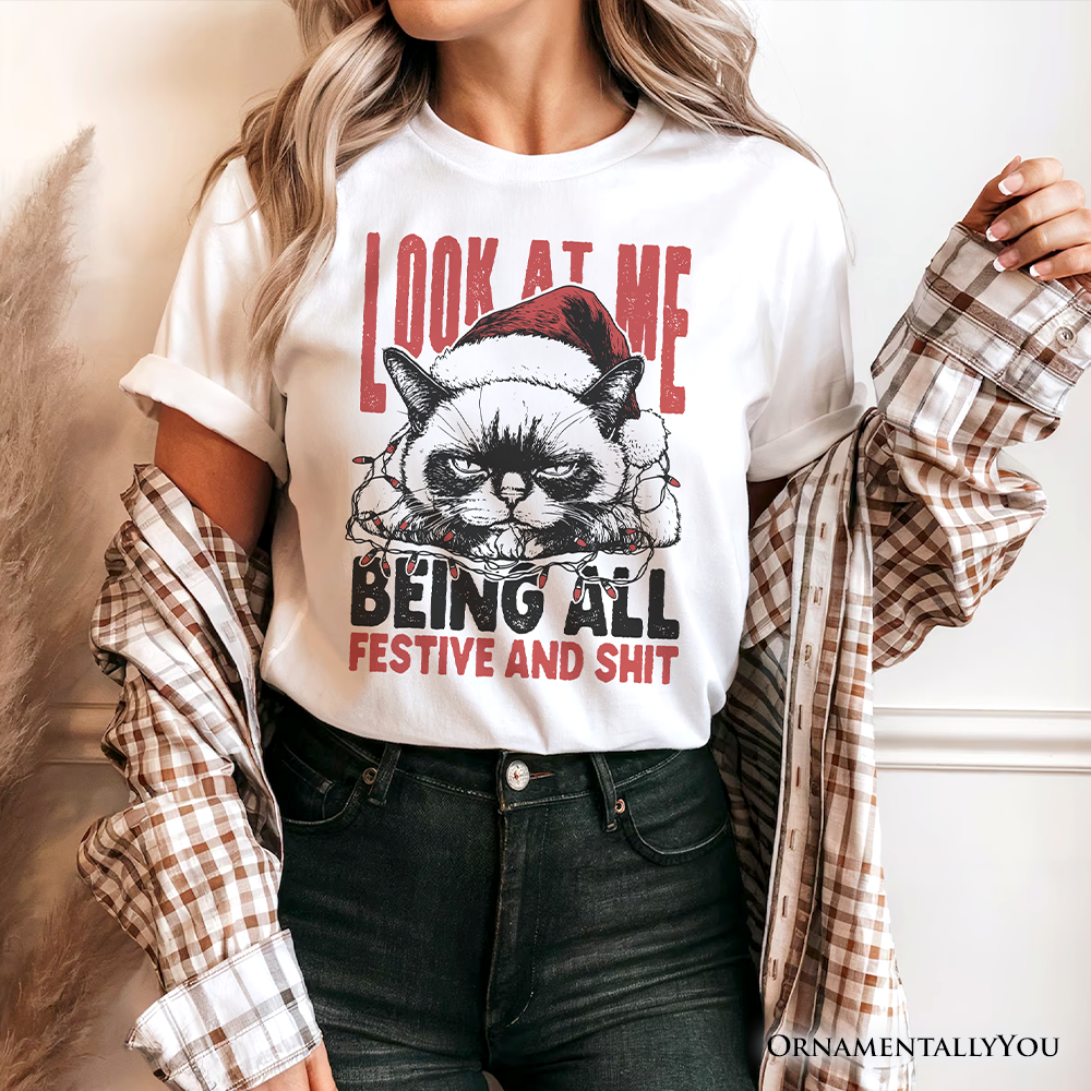 Grumpy Christmas Cat T‑Shirt, Funny Santa Hat Holiday Lights Tee for Sarcastic Festive People
