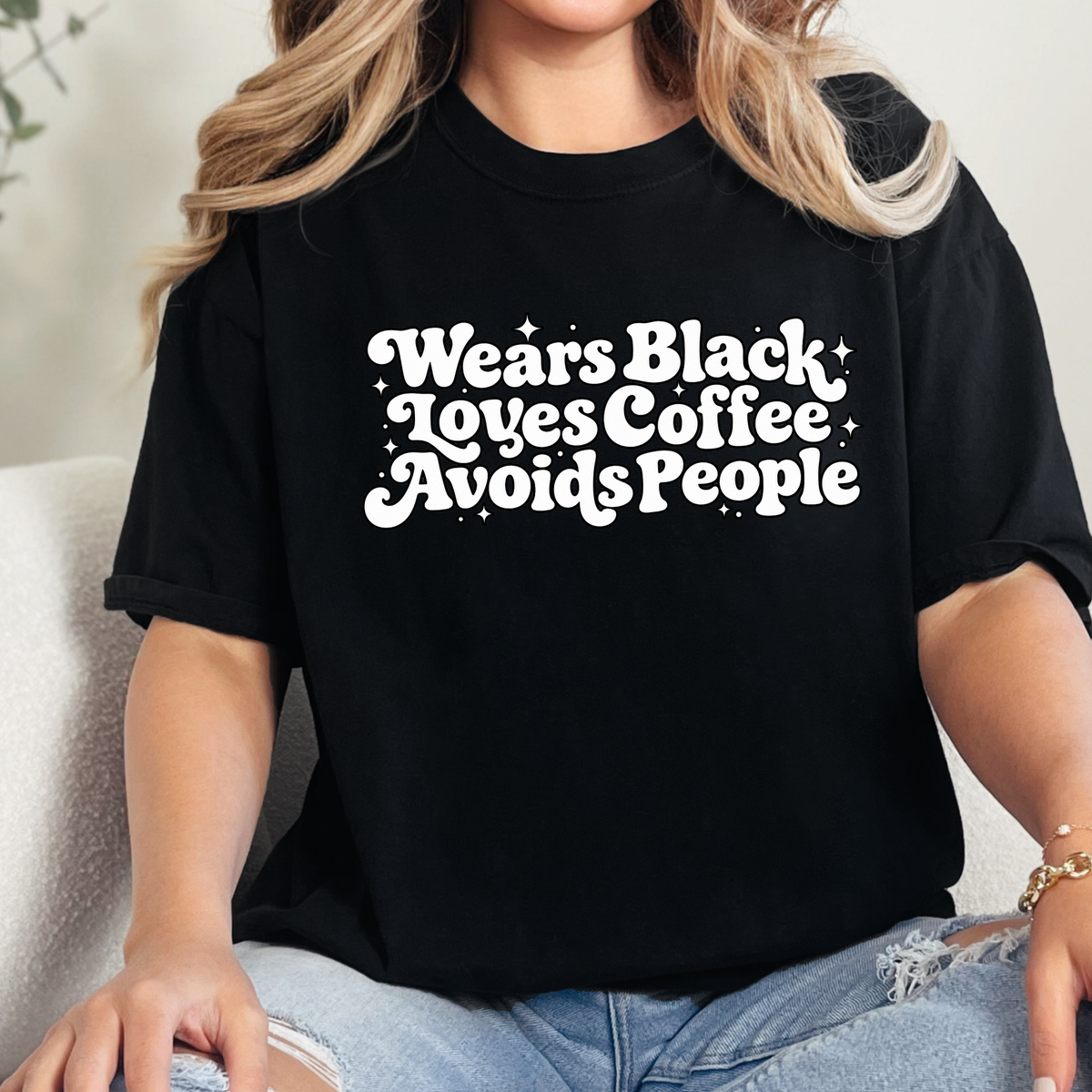 Wears Black Graphic Tee or Sweatshirt