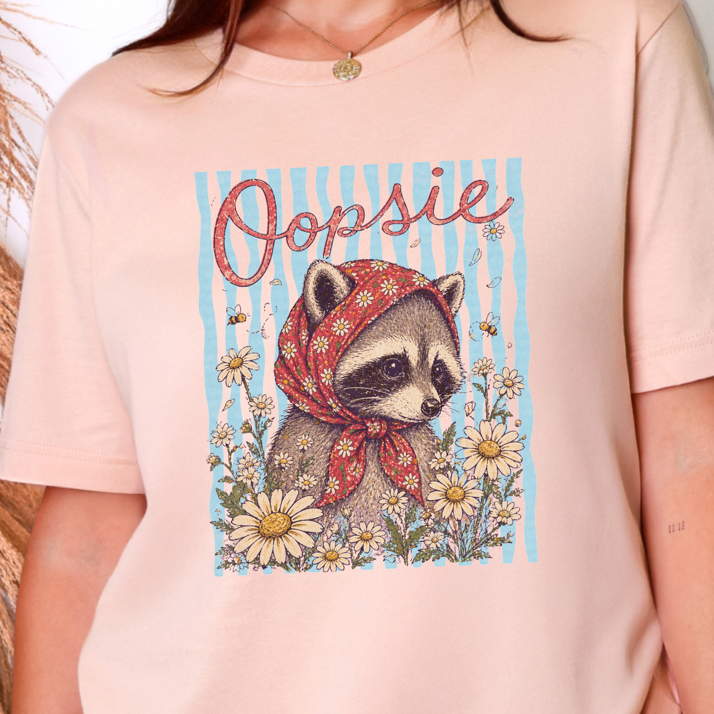 Oopsie Raccoon Graphic Tee