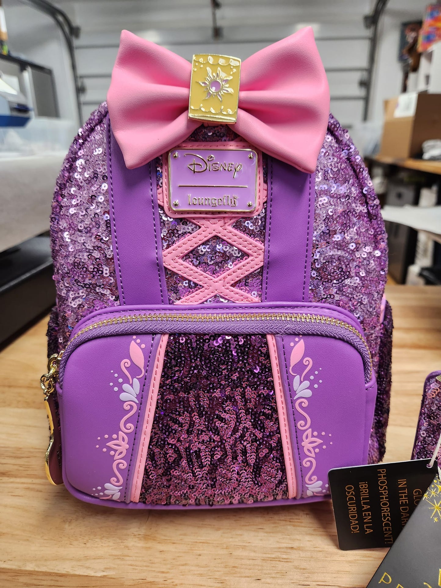 LOUNGEFLY REPUNZEL SEQUIN GLOW BOW SET (BACKPACK AND WALLET)