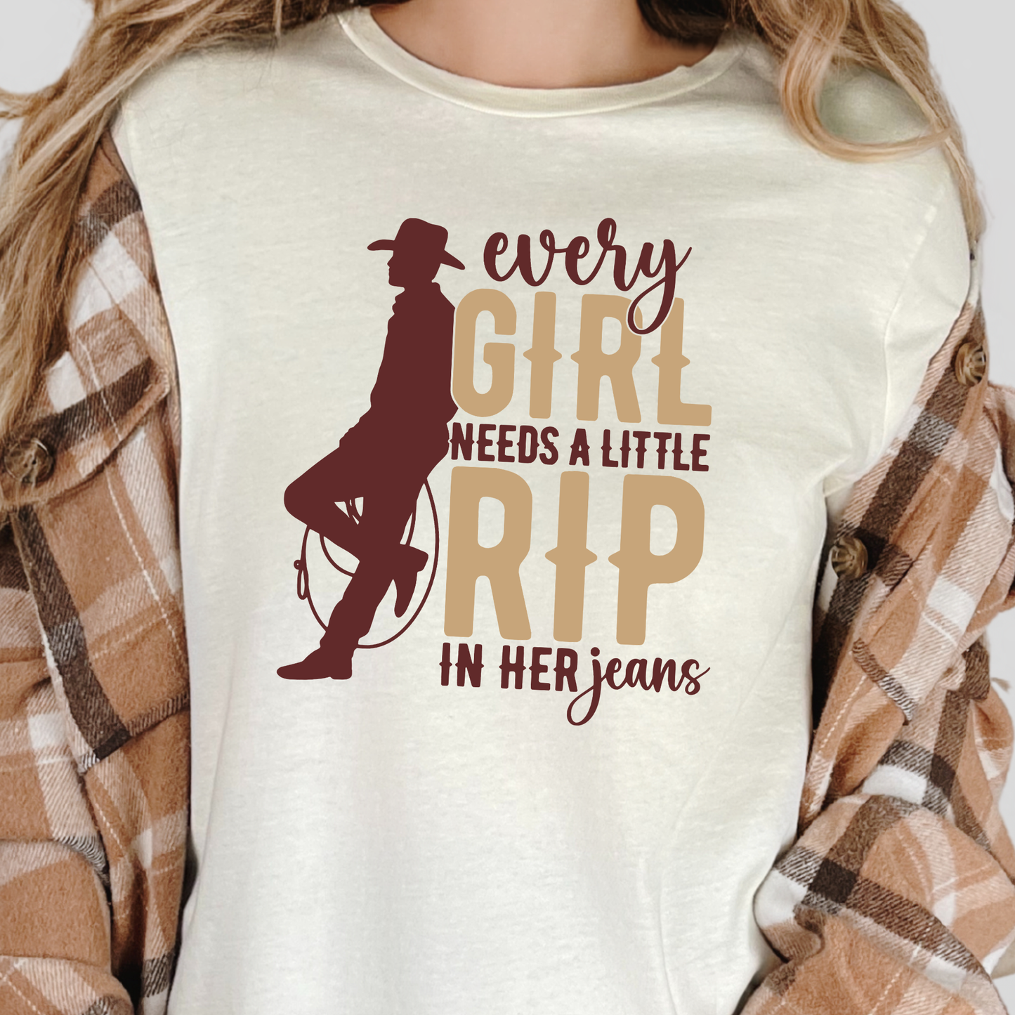 A Little Rip in her Jeans Graphic Tee