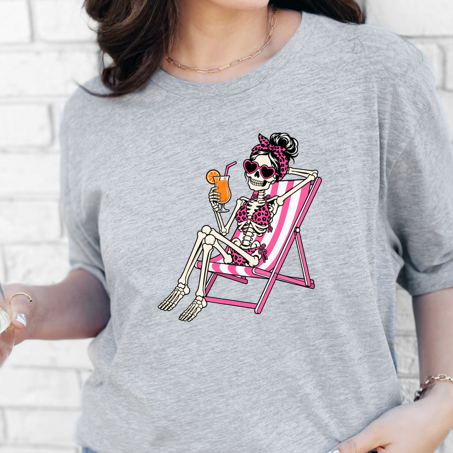 Skeleton in Lawn Chair Graphic Tee