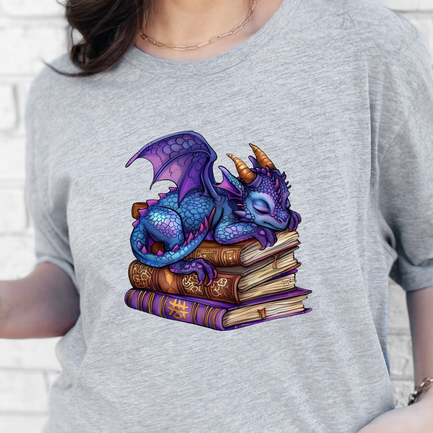 Dragon Sleeping on Books Graphic Tee