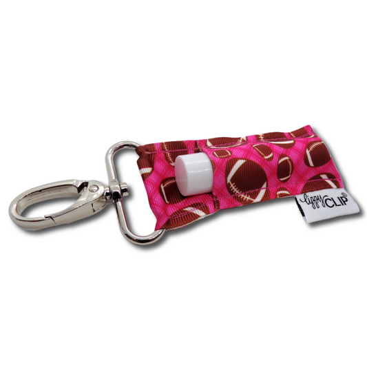 Footballs on Pink LippyClip® Lip Balm Holder