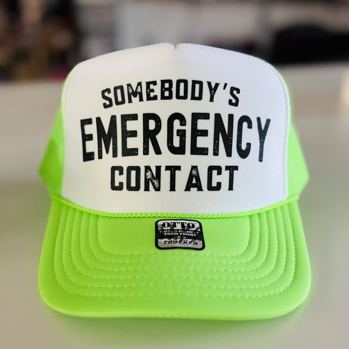 Somebody's Emergency Contact Trucker Hat