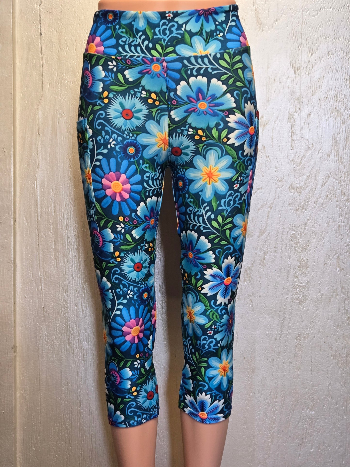 Floral on green capris with pockets