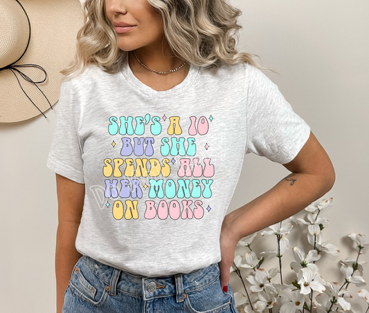 SPENDS MONEY ON BOOKS -UNISEX TEE ADULTS/KIDS
